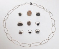 Hammered silver chain and collection of silver rings